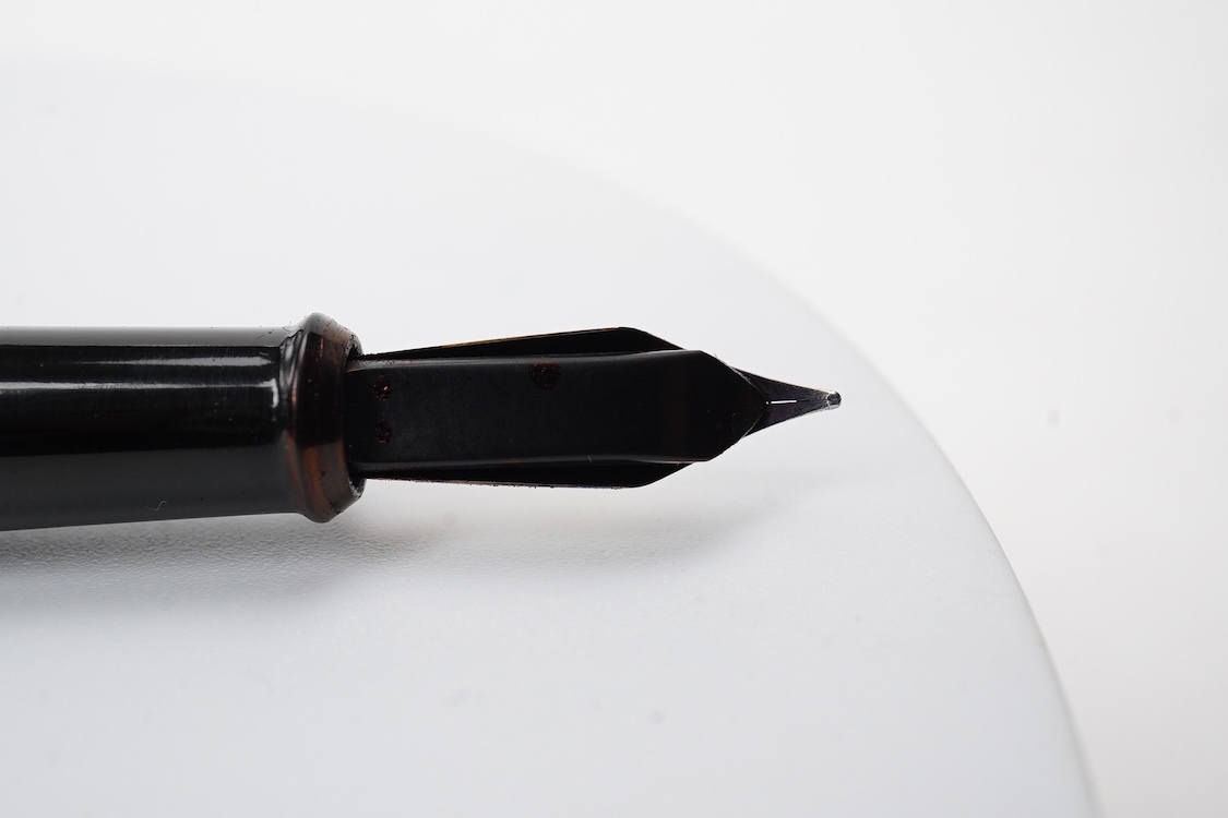 A De la Rue Onoto piston fill fountain pen in large size with ornate cap banding and fitted with DLR Onoto No.5 14ct. nib